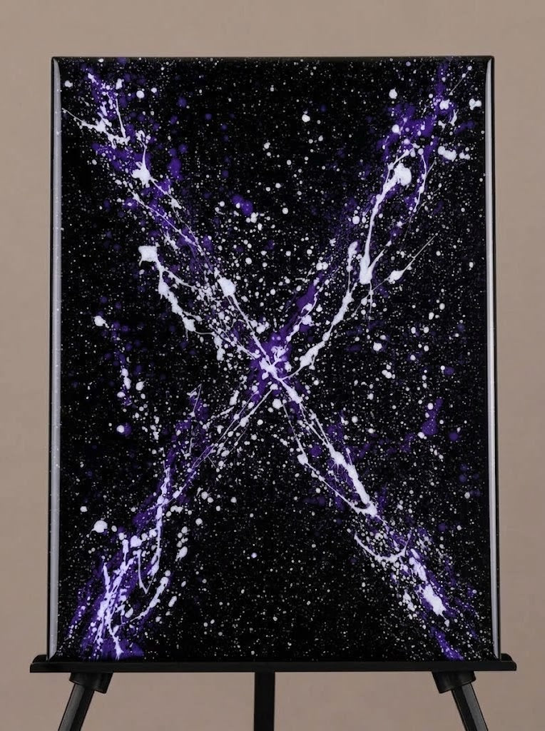 Cosmic purple and white splatter painting on black canvas
